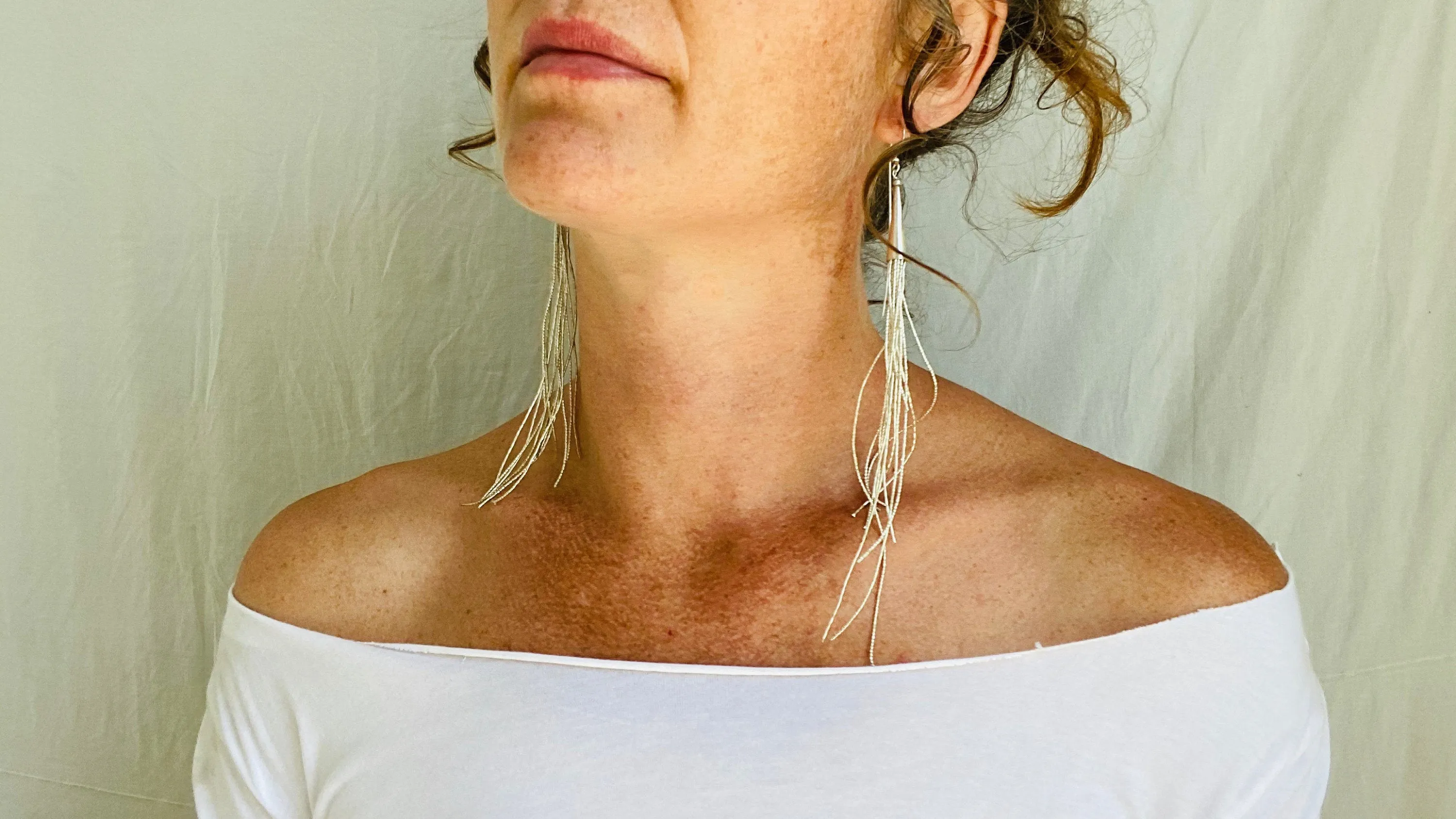 Long Liquid Silver Earrings. .99 Silver