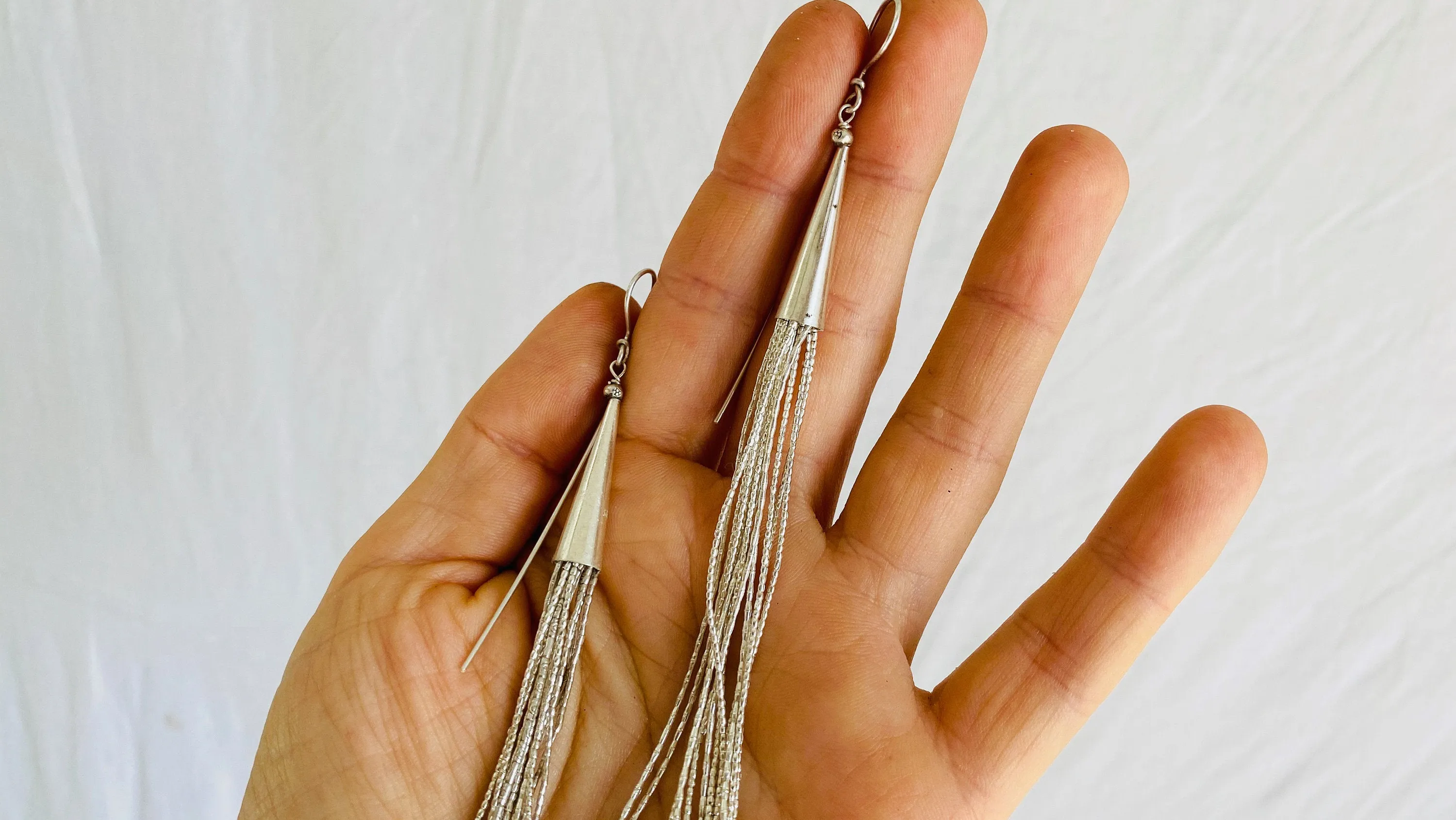 Long Liquid Silver Earrings. .99 Silver