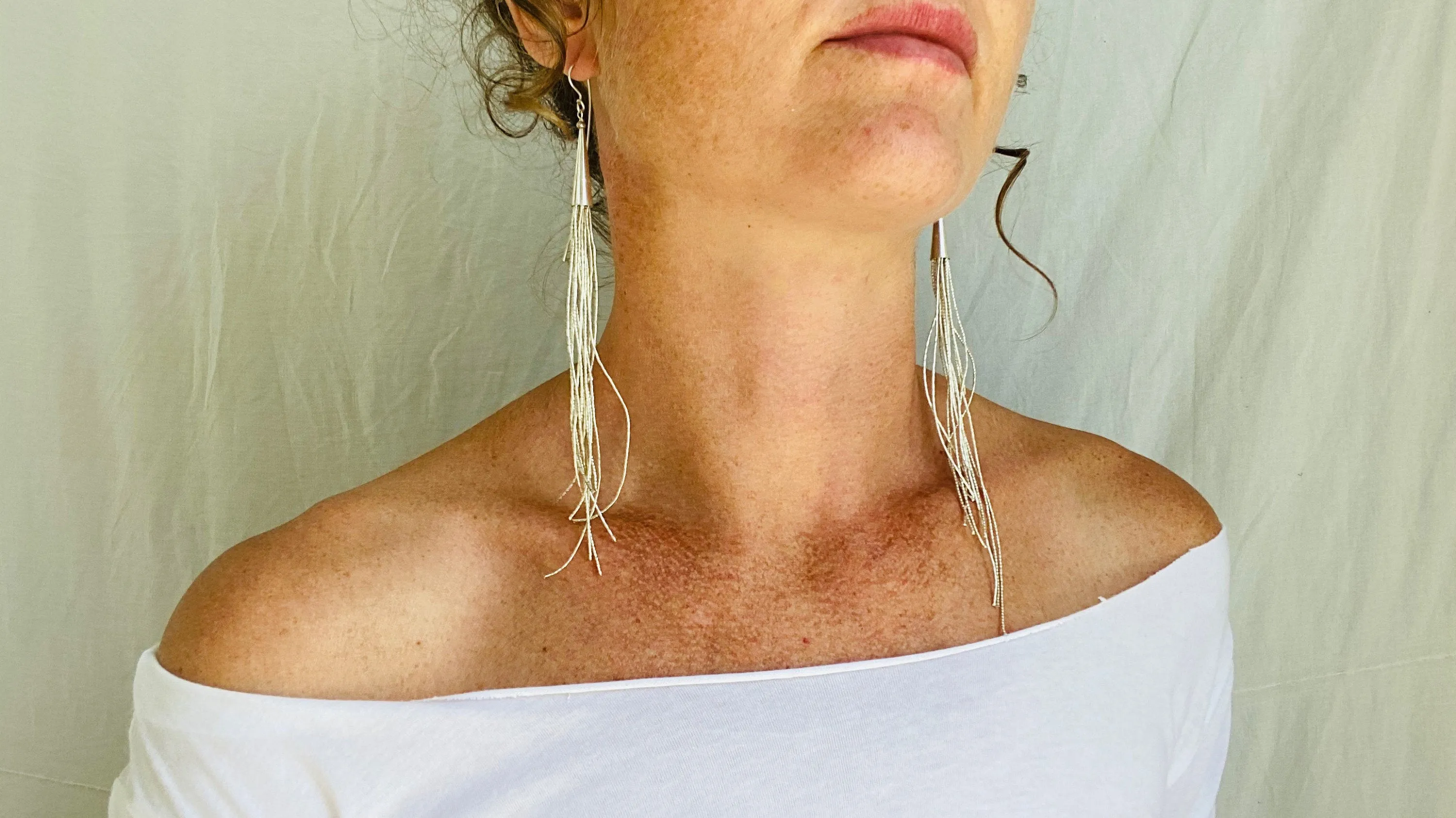 Long Liquid Silver Earrings. .99 Silver